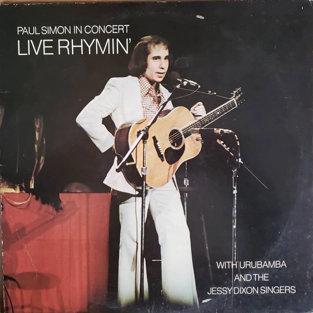 Paul Simon with Urubamba and The Jesse Dixon Singers – Paul Simon In Concert: Live Rhymin’, 1974 on Columbia.