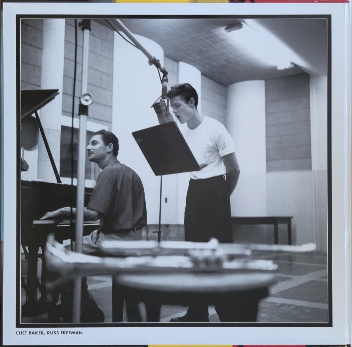 B&W photo of Chet Baker singing in studio