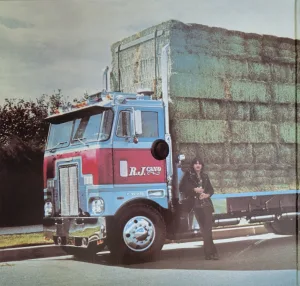 a truck is parked in front of a building