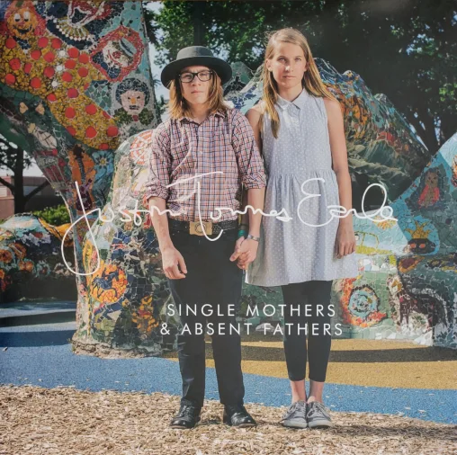 Album cover - young man and woman standing holding hands