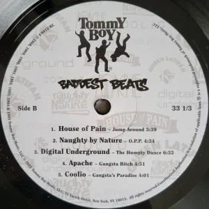 record label with Tommy Boy logo and track list 