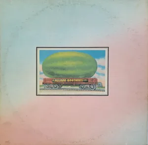 album cover - giant watermelon on a track 