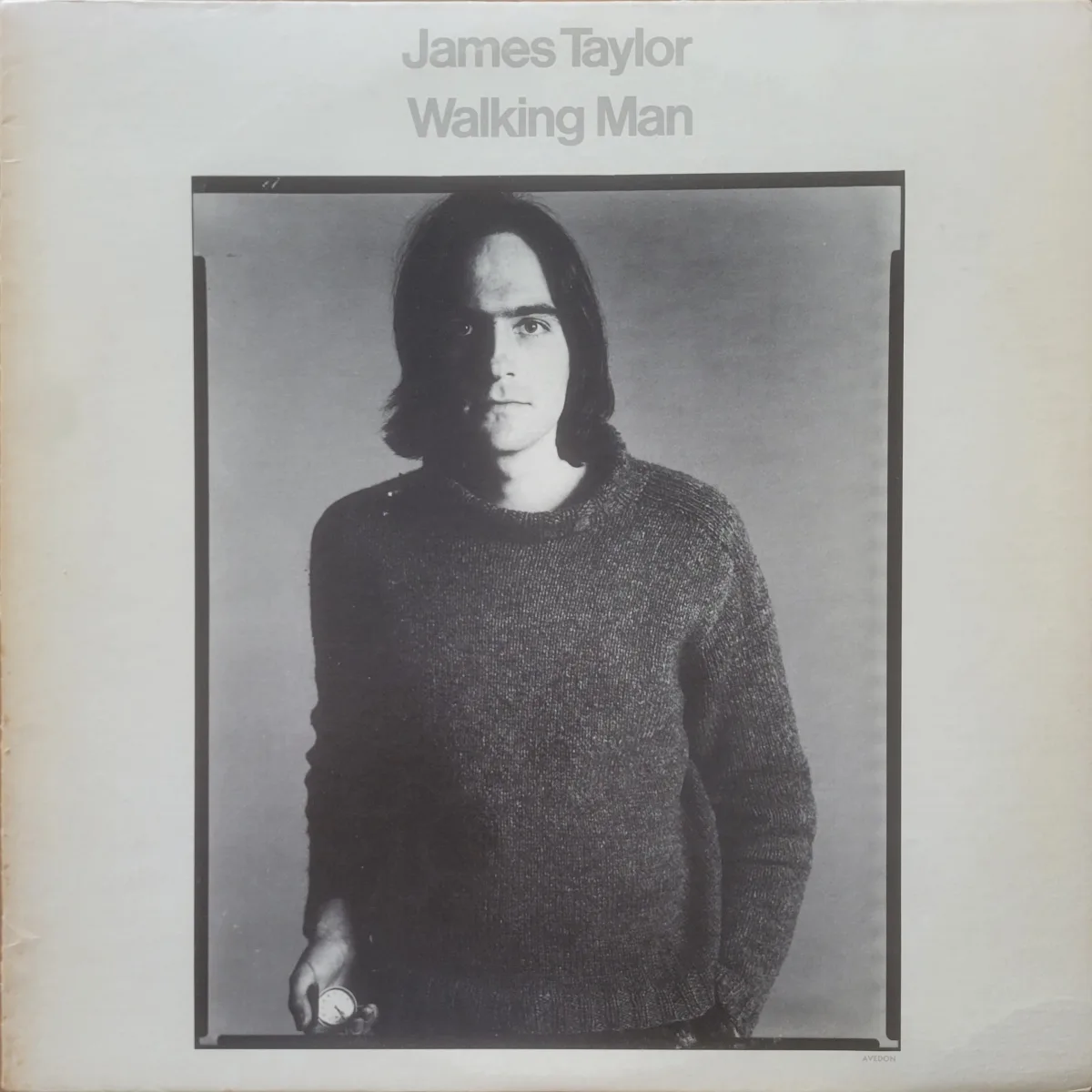 Cover photo of James Taylor in black & white