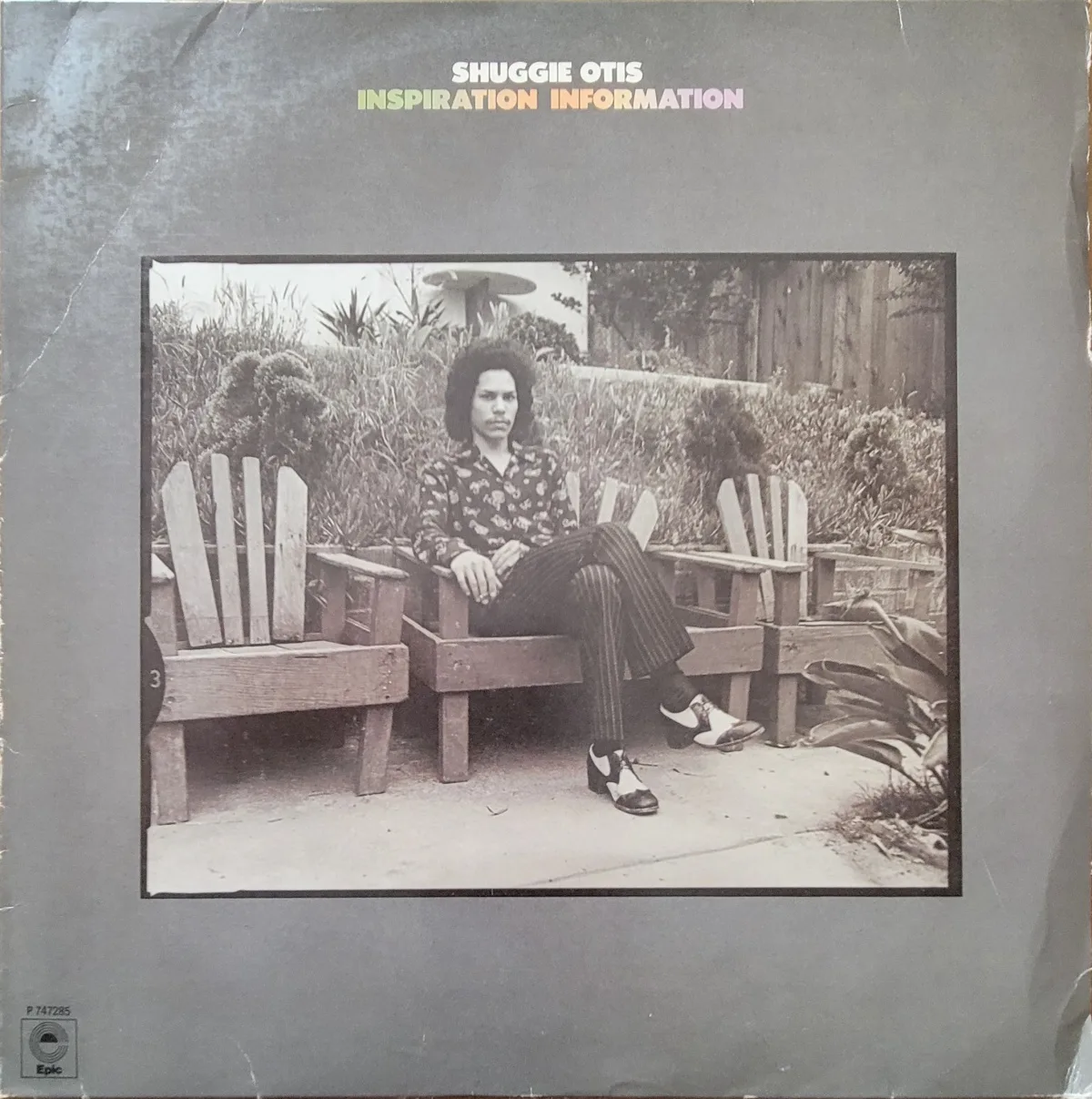 Cover photo of Shuggie Otis on an adirondak chair